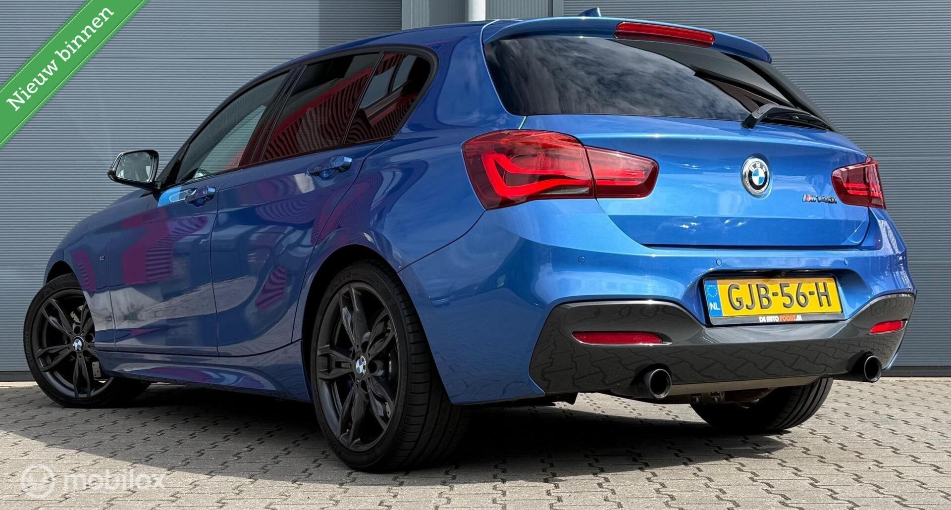 BMW 1-serie M140i xDrive LCI2 Edition Shadow Executive Navi+, Auto's, BMW, Gebruikt, Met garantie (alle), Blauw, 340 pk