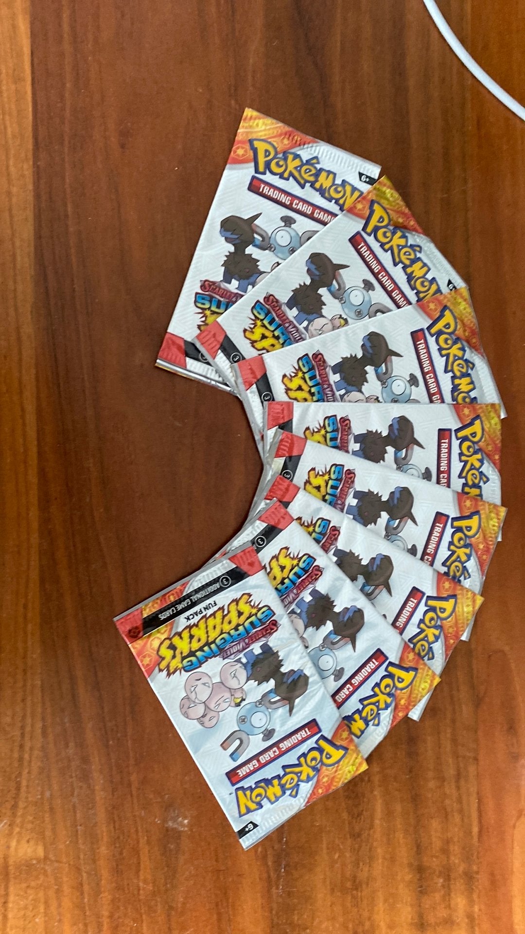 8 mooie fun packs van surging sparks, Ophalen of Verzenden, Nieuw, Booster, Foil