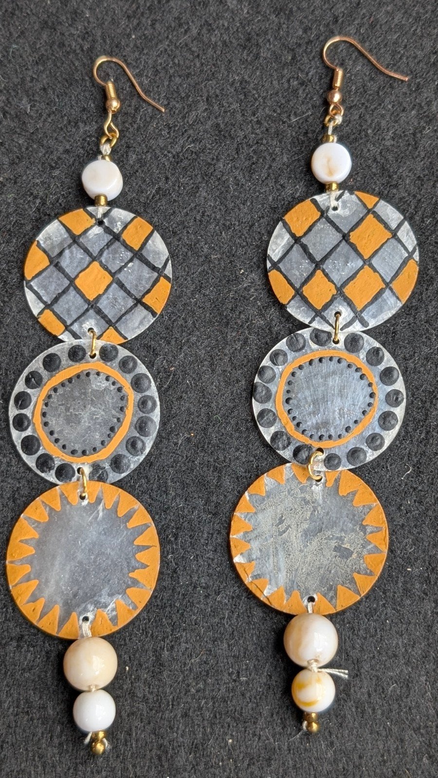Unieke handgemaakte oorbellen met geometrische patronen, Overige materialen, Hangers, Oranje, Ophalen of Verzenden