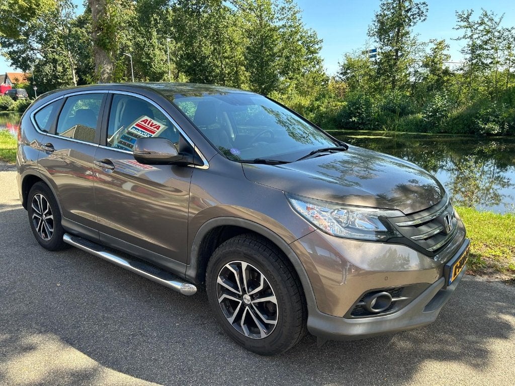 Honda CR-V 2.0 I-vtec 114KW 2WD 2013 Bruin, Auto's, Voorwielaandrijving, Stof, Zwart, 4 cilinders