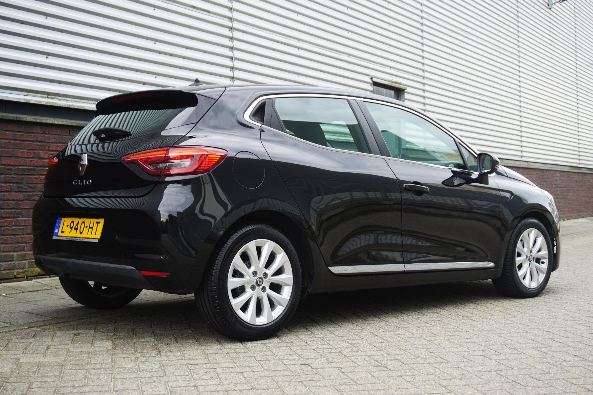 Renault Clio 1.0 TCe Intens/Half Leer/Sfeerverlichting/DigiD, Auto's, Voorwielaandrijving, Gebruikt, Leder en Stof, Origineel Nederlands