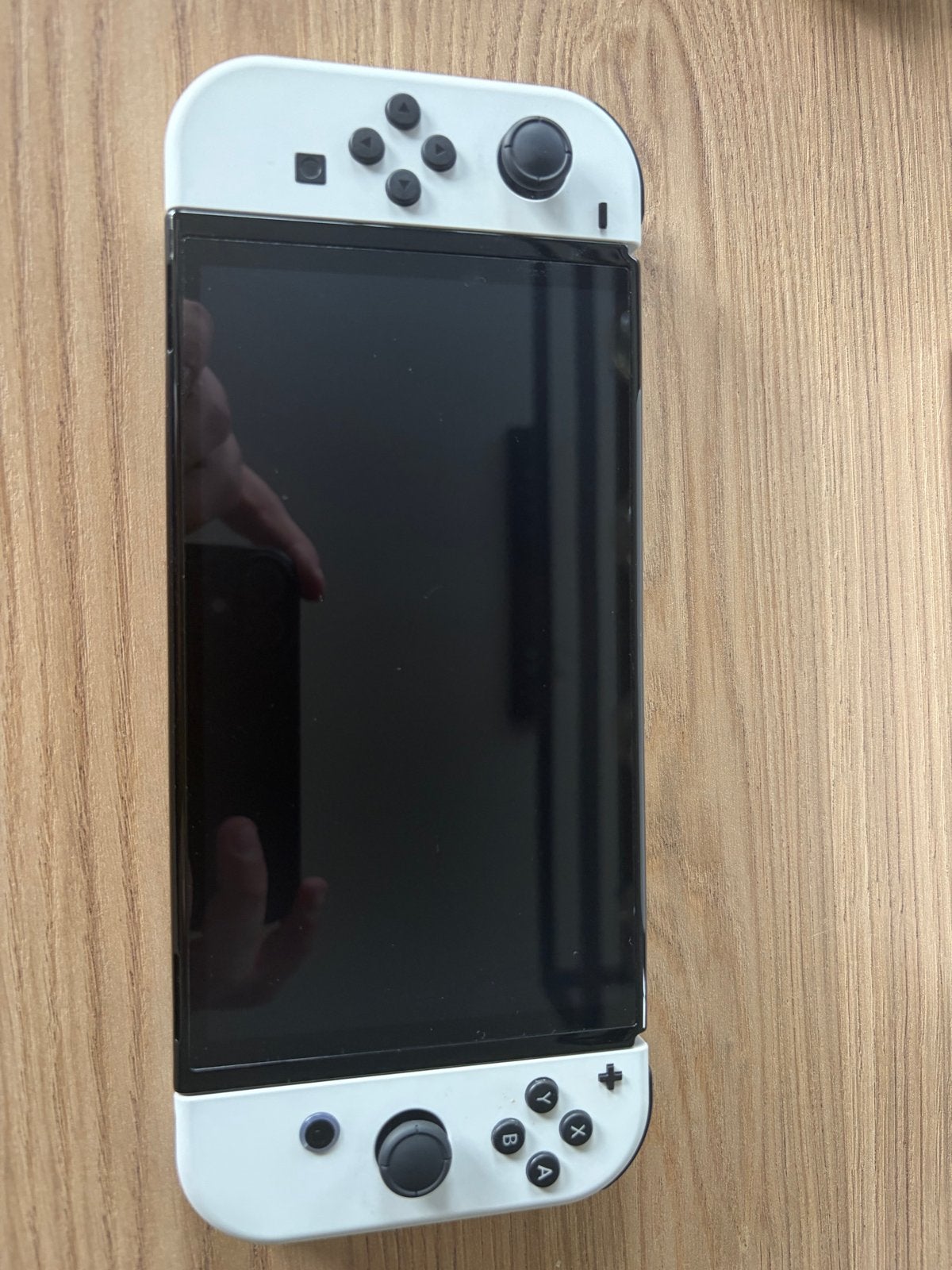 Foto 3 van Nintendo Switch OLED met 2 games en accessoires