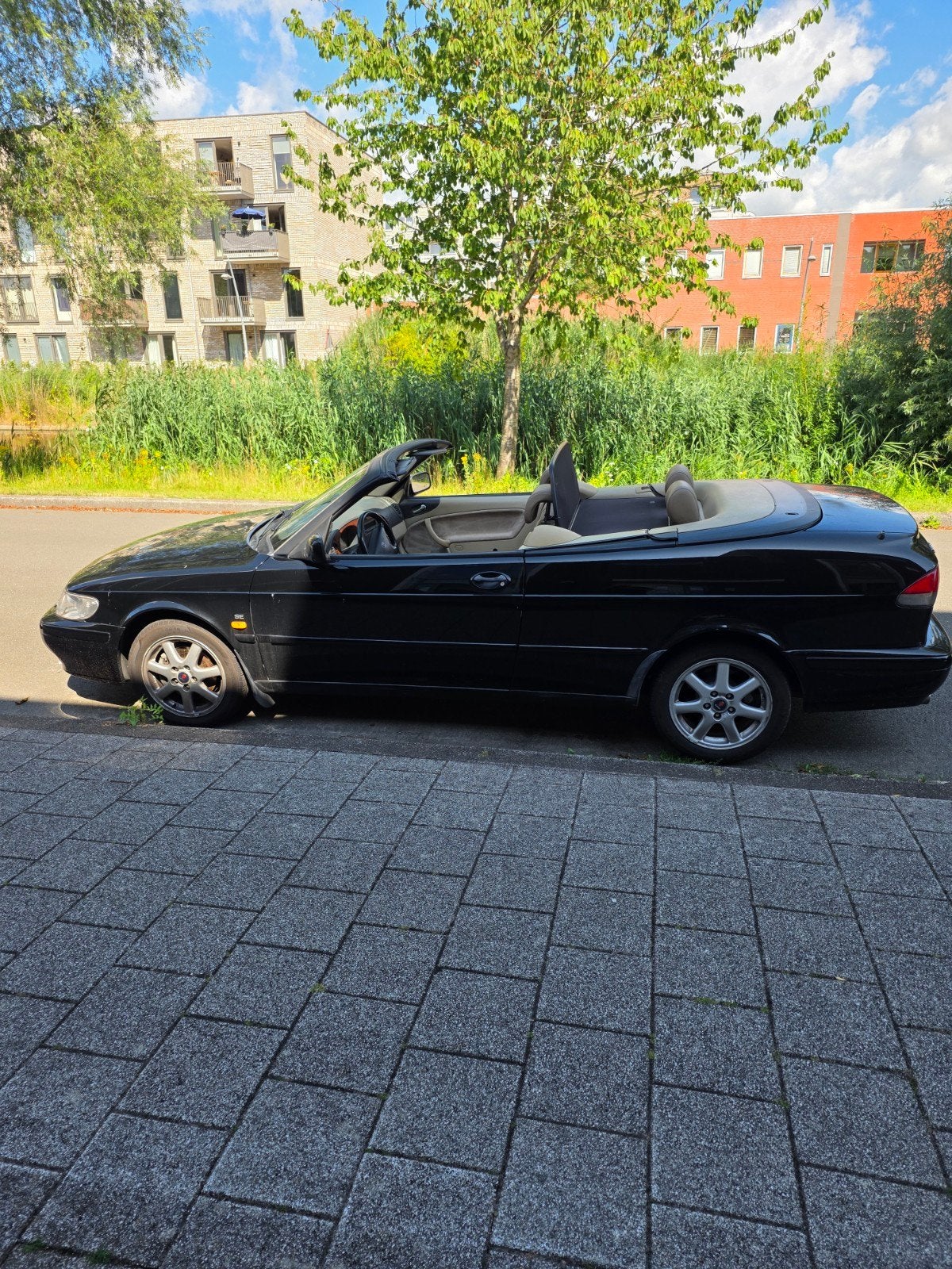 Saab 9-3 2.0 Turbo Cabrio AUT 1999 Zwart met APK, Auto's, Beige, 4 cilinders, Cabriolet, 4 stoelen
