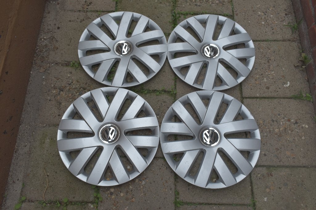 Set van 4 originele wieldoppen Volkswagen Polo 15 inch, Auto diversen, Ophalen of Verzenden, Gebruikt