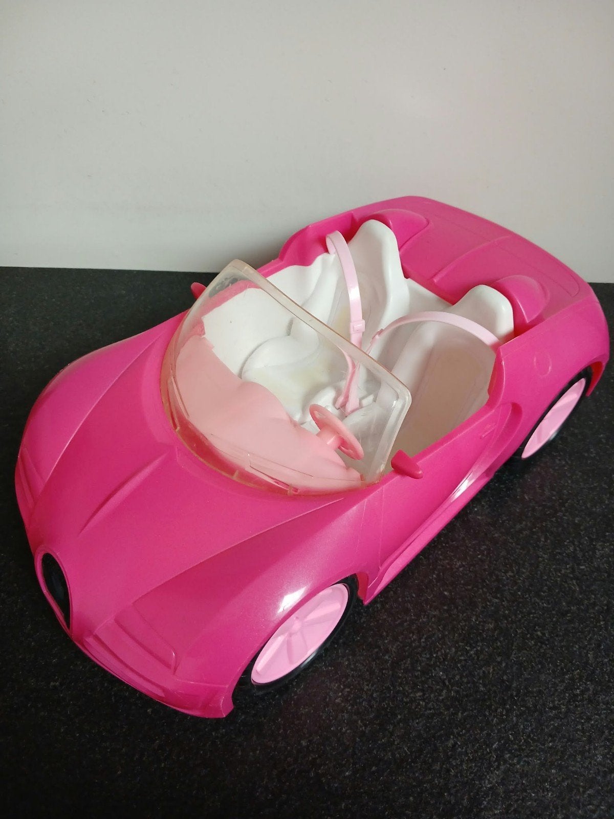 4 poppen met auto en extra kleren, Ophalen of Verzenden, Gebruikt, Barbie
