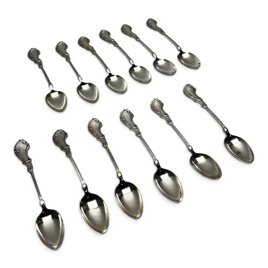 Set zilveren schepwerk met rocaille-patroon, Antiek en Kunst, Ophalen of Verzenden, Zilver