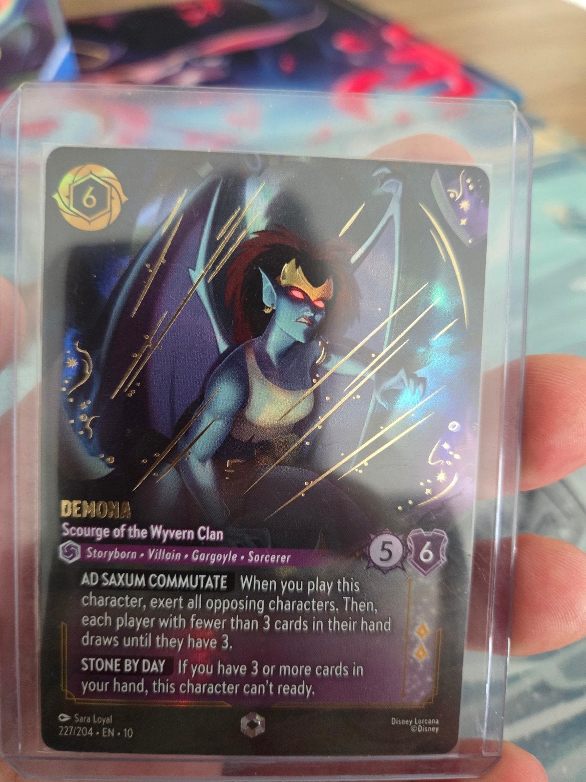 Lorcana Enchanted Demona Scourge of the Wyvern Clan, Ophalen of Verzenden, Nieuw, Losse kaart, Foil