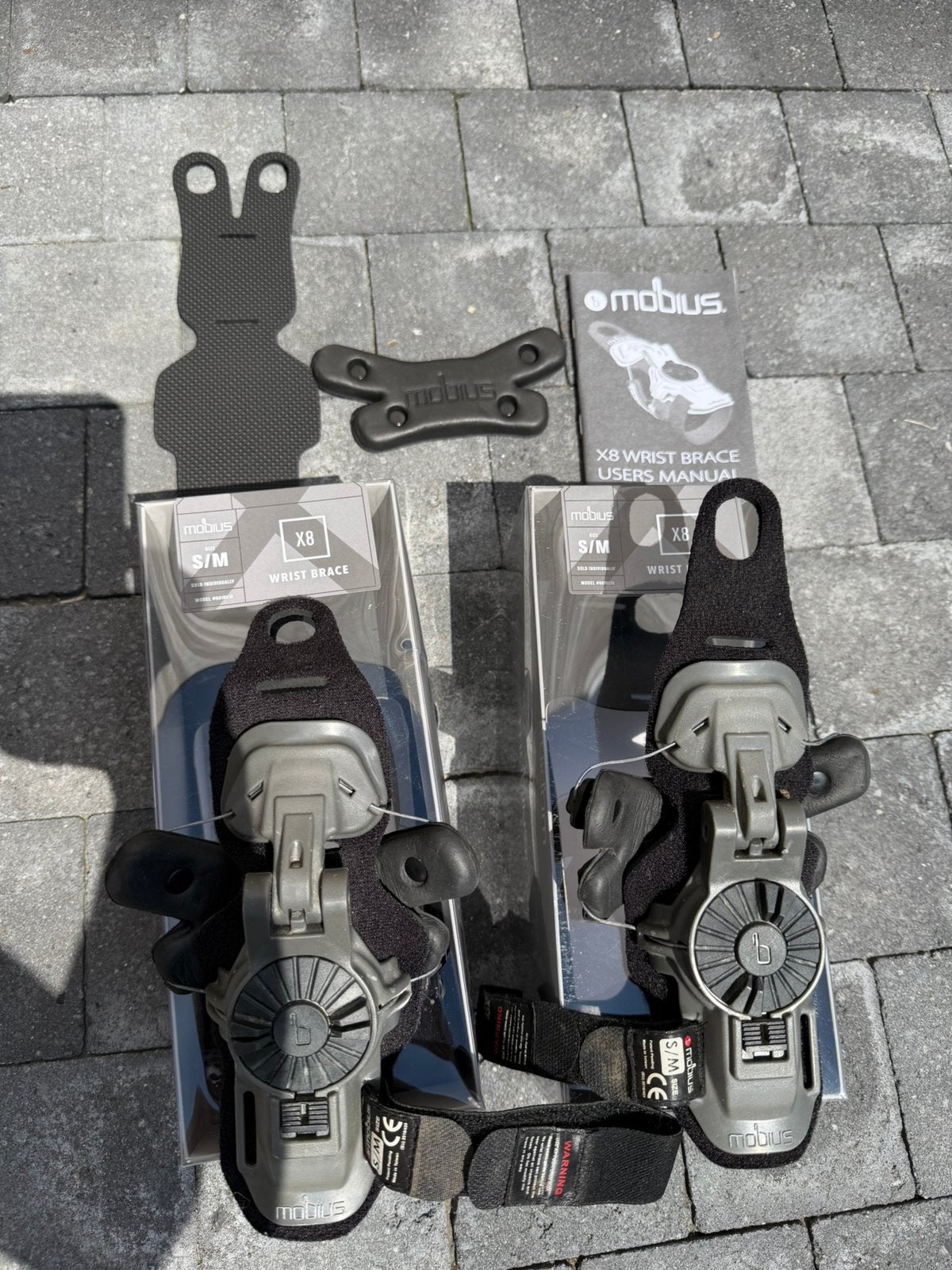 Mobius polsbrace  set Zgan S/M, Ophalen of Verzenden, Zo goed als nieuw