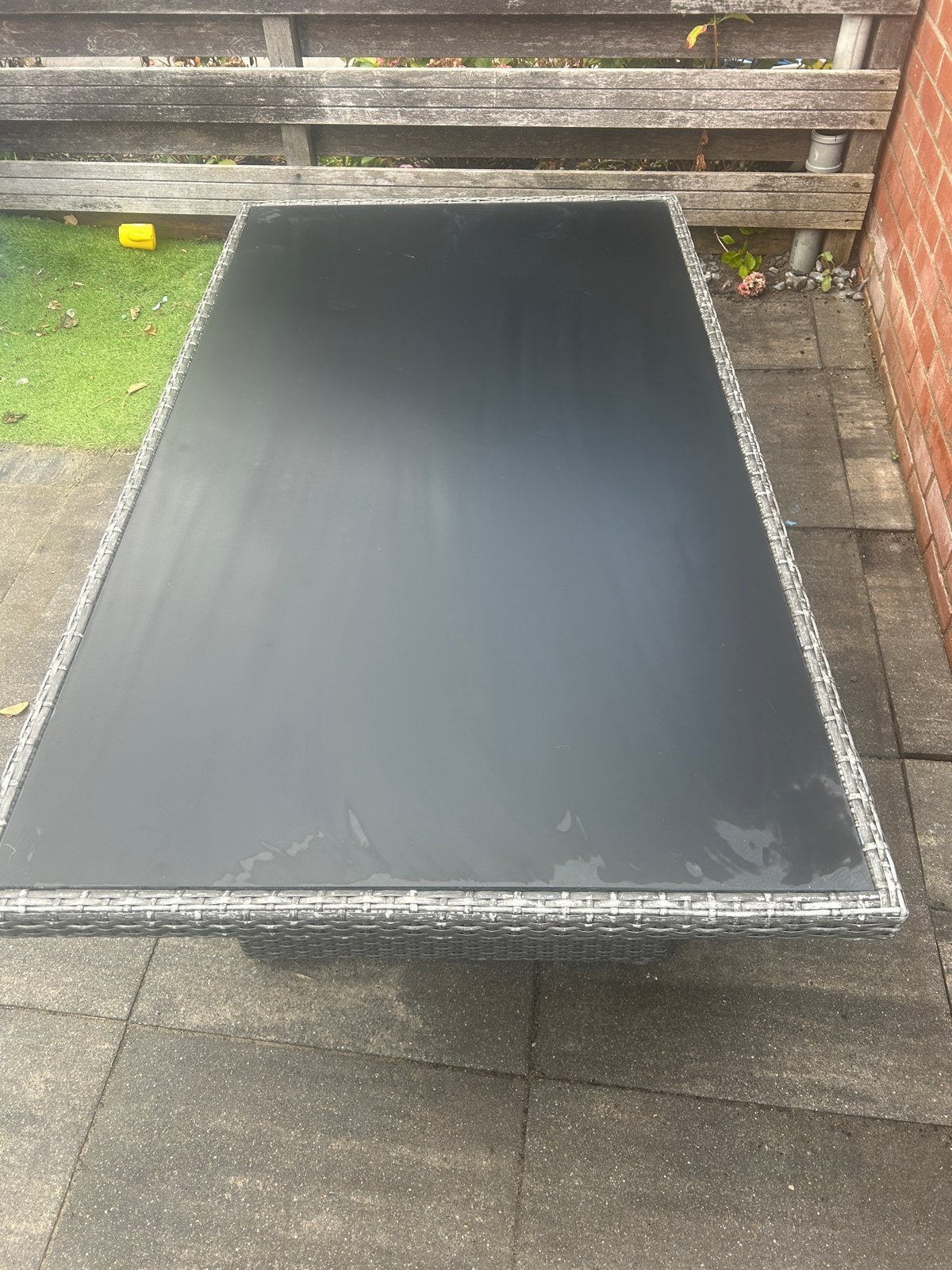 Foto 6 van Wicker tuintafel met glazen blad