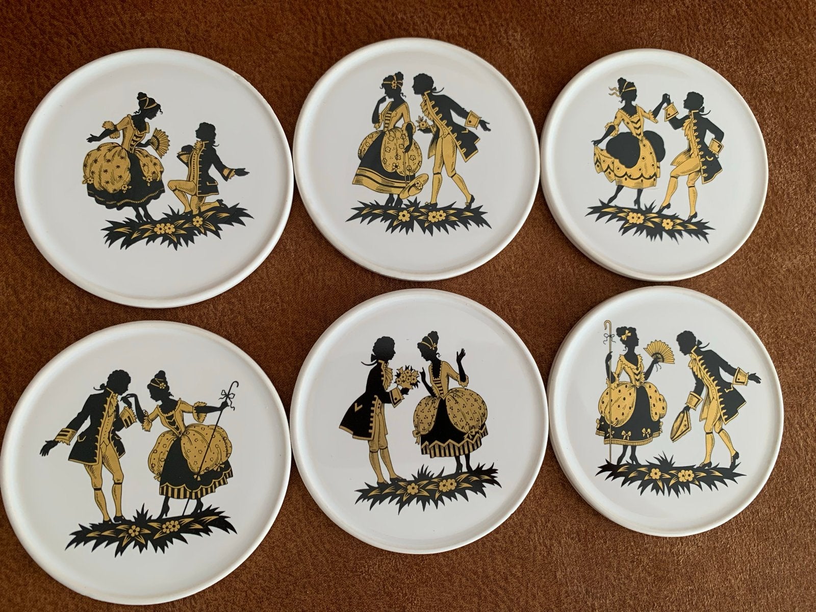 Vintage porseleinen Engelse onderzetters met silhouetten, Ophalen of Verzenden