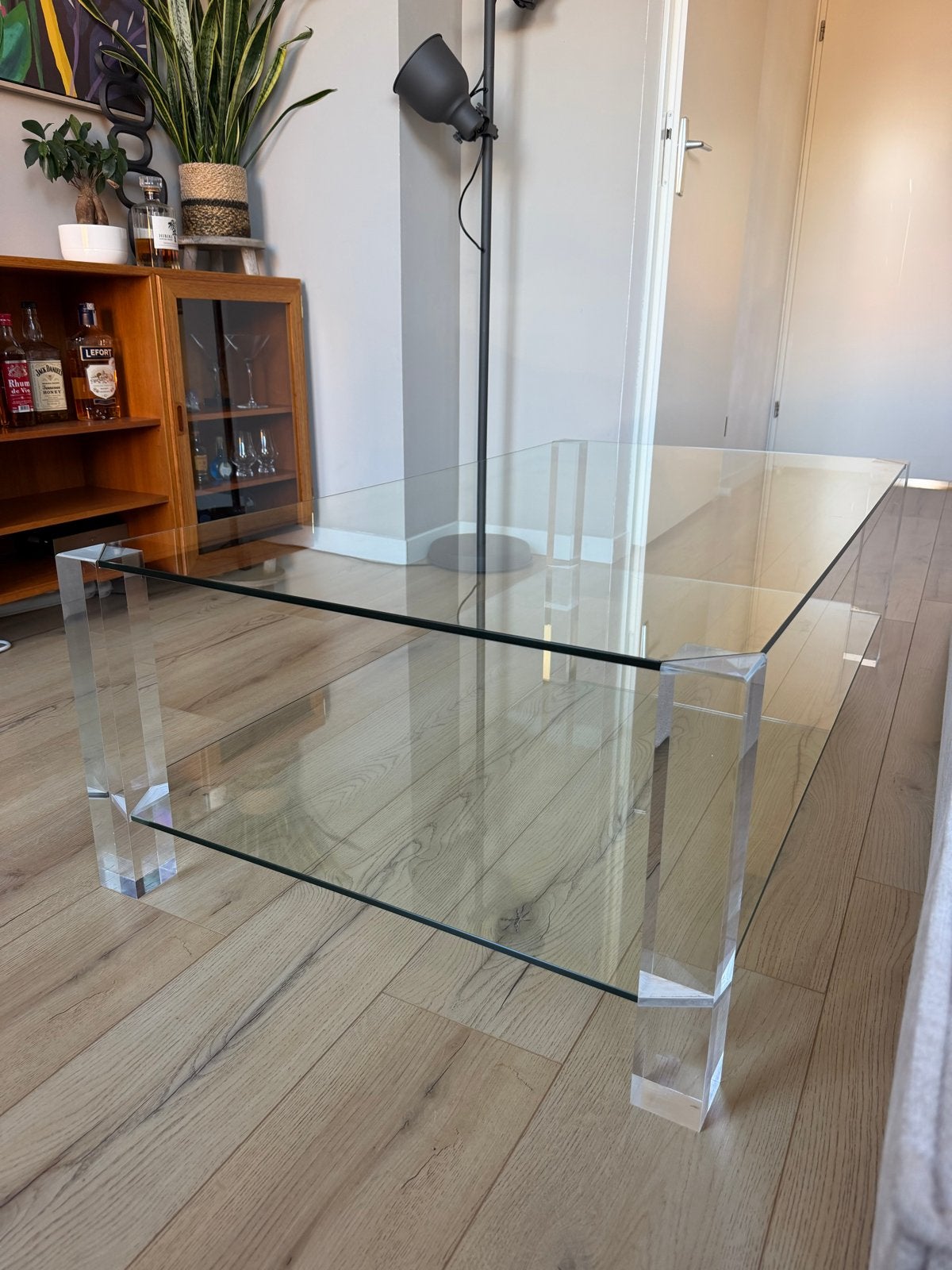 Glazen desiner salontafel van Nierop met plexiglas poten, Ophalen, Gebruikt, 100 tot 150 cm, 50 tot 100 cm