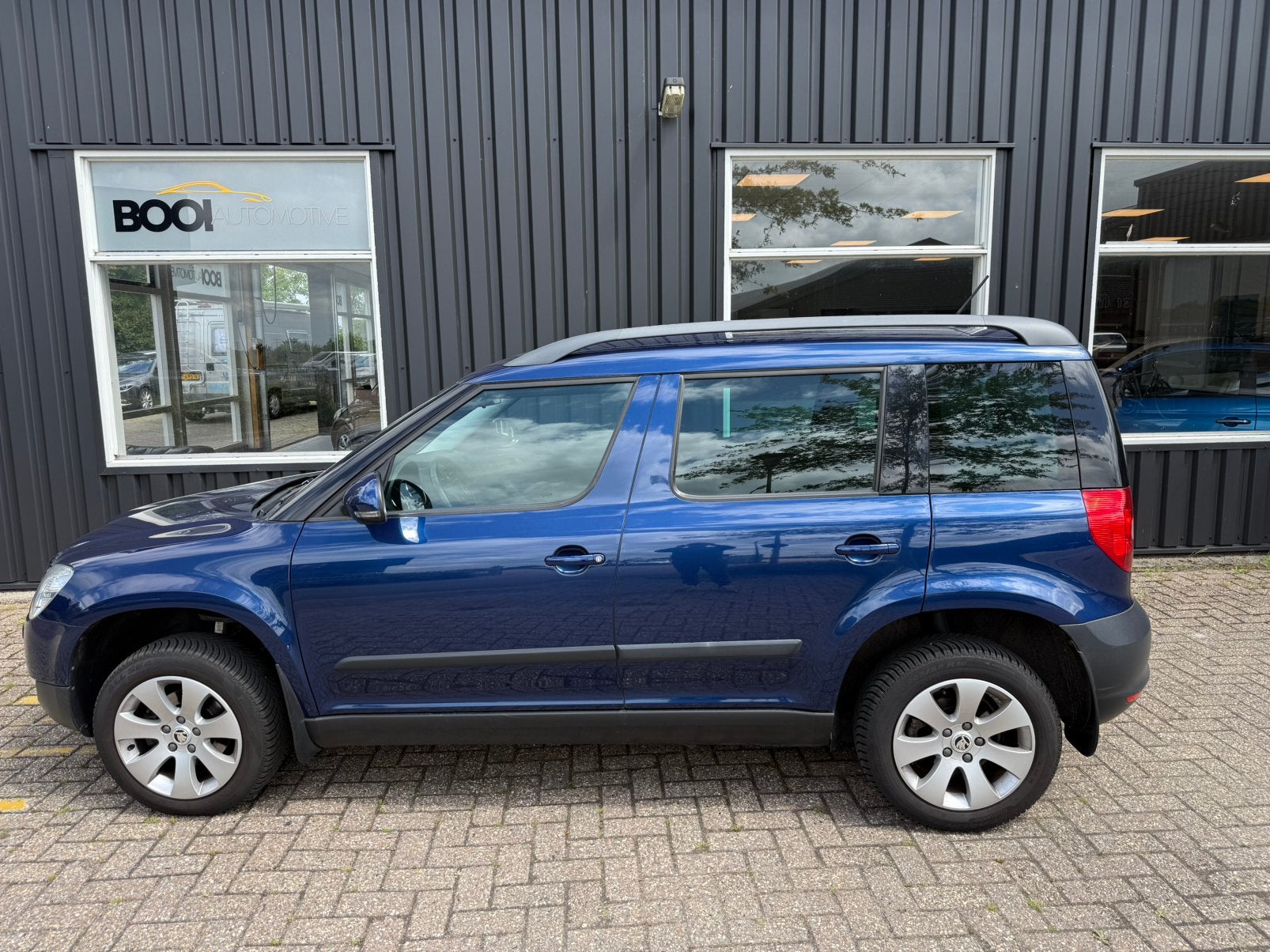 Skoda Yeti 1.2 TSI 105pk Eerste eigenaar Airco trekhaak, Voorwielaandrijving, Stof, Zwart, 4 cilinders