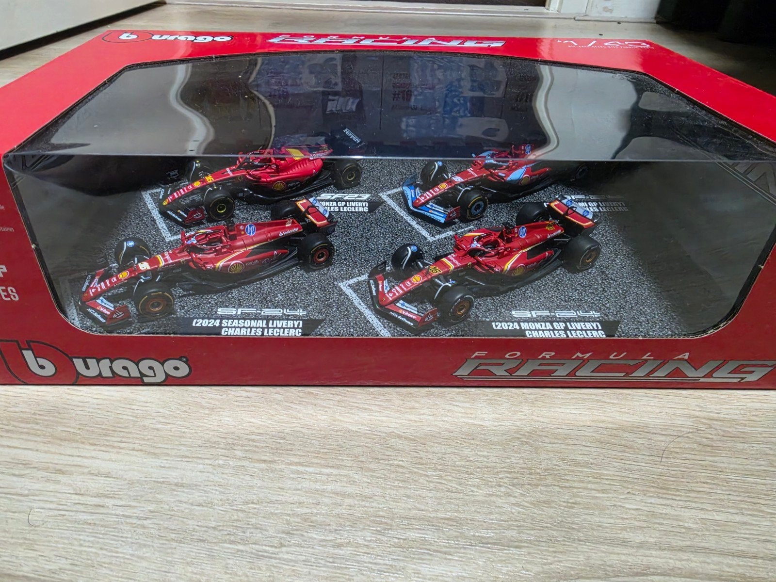 Bburago Ferrari F1 2024 Charles Leclerc Set (4 stuks), Ophalen of Verzenden, Nieuw, Auto