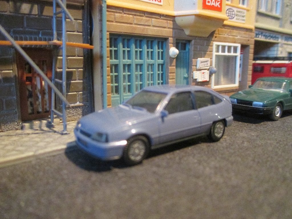 Opel Kadett E Gsi - Herpa blauwgrijs, Ophalen of Verzenden, Zo goed als nieuw, Auto, Herpa