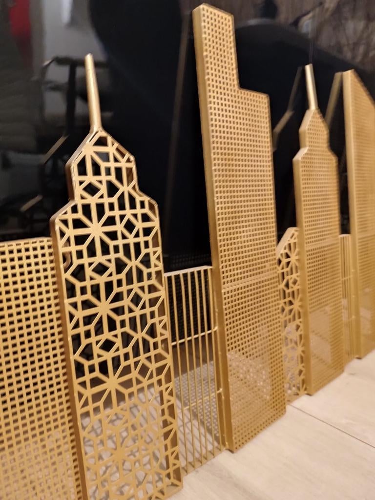 Metalen wanddecoratie skyline. Goud, Ophalen, Zo goed als nieuw