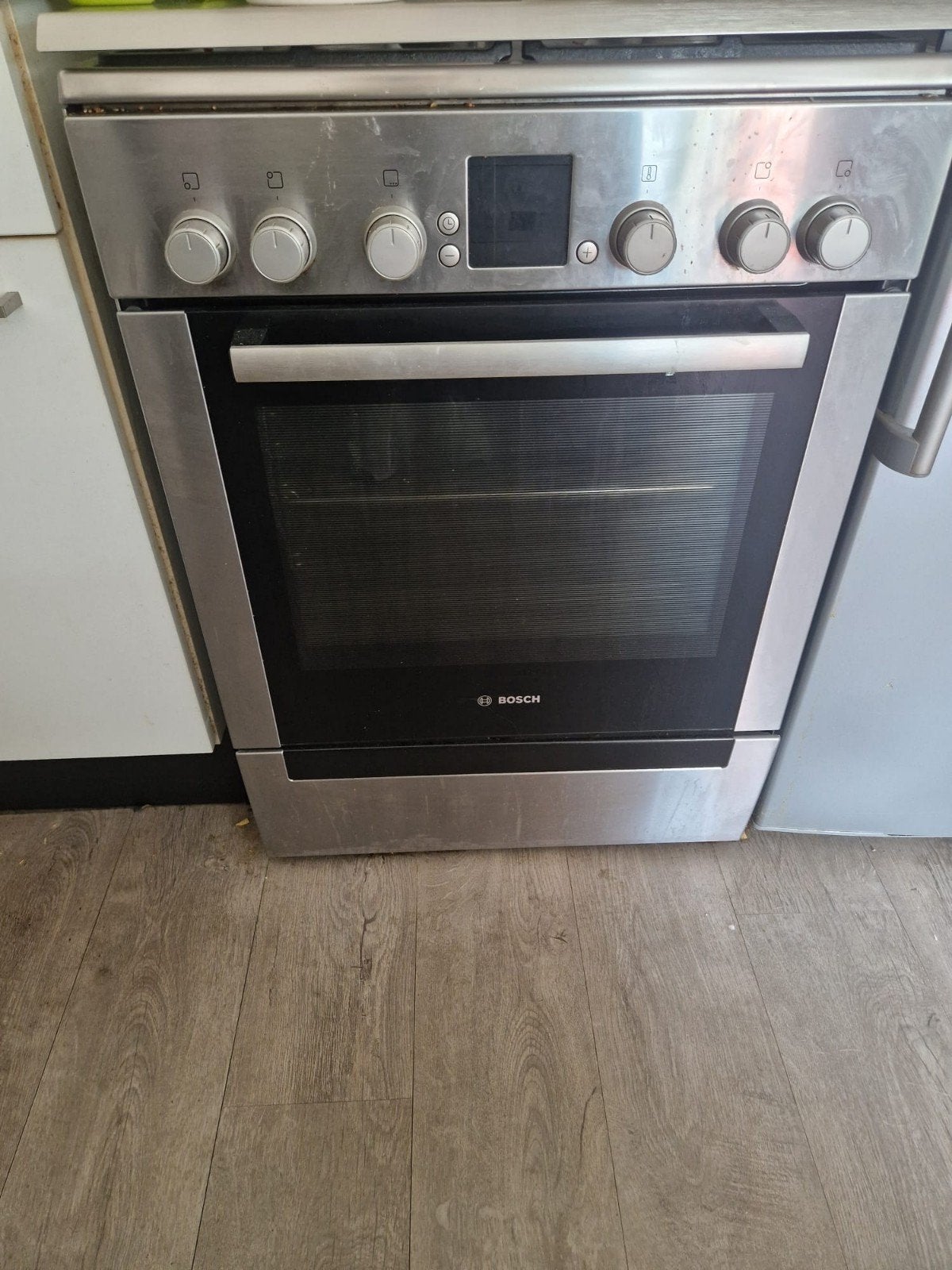 Goedwerkend  Bosch gasfornuis, Ophalen, 4 kookzones, Gas, Vrijstaand