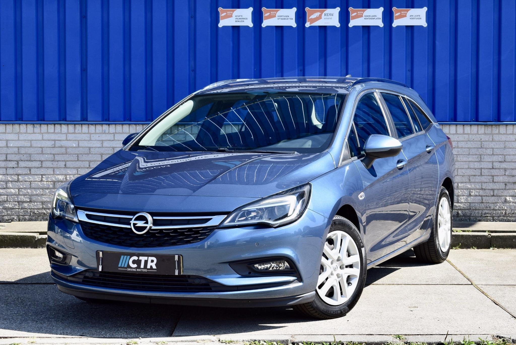 Opel Astra Sports Tourer 1.4 Edition, Auto's, Opel, Voorwielaandrijving, Stof, Gebruikt, 4 cilinders