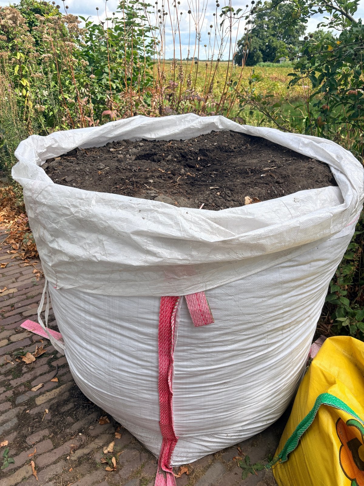 Bigbag schone grond (1 kuub), Tuin en Terras, Zand, Ophalen, Gebruikt, Overige typen