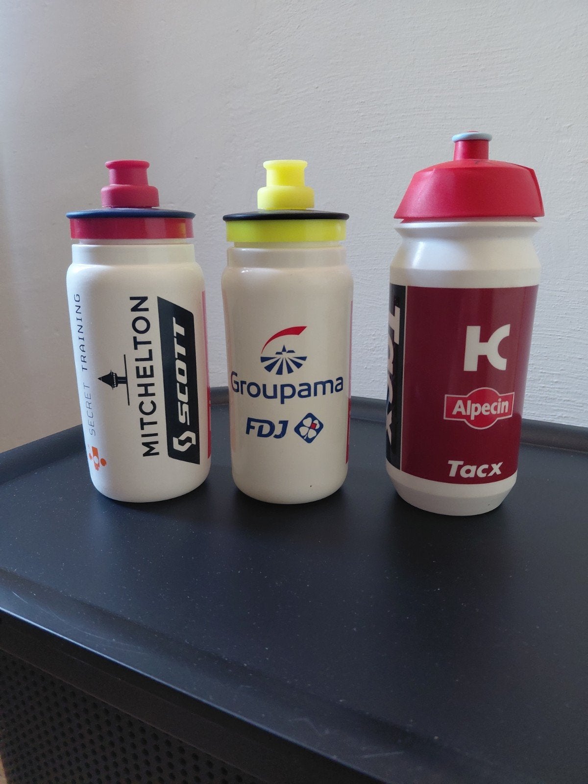 bidons  set van 3 van professionele wielerteams., Ophalen of Verzenden, Zo goed als nieuw, Overige typen