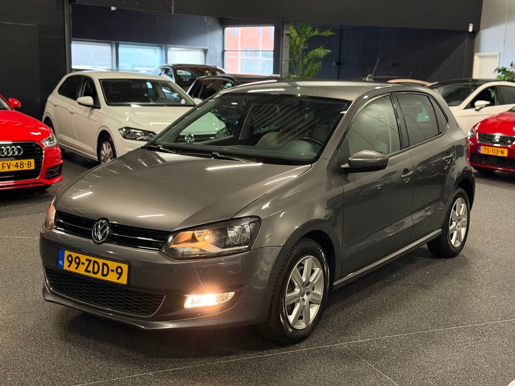 Volkswagen Polo 1.2 TSI Highline 2E-EIG/AIRCO/NAVI/CRUISE/BT, Voorwielaandrijving, Euro 5, Stof, Beige