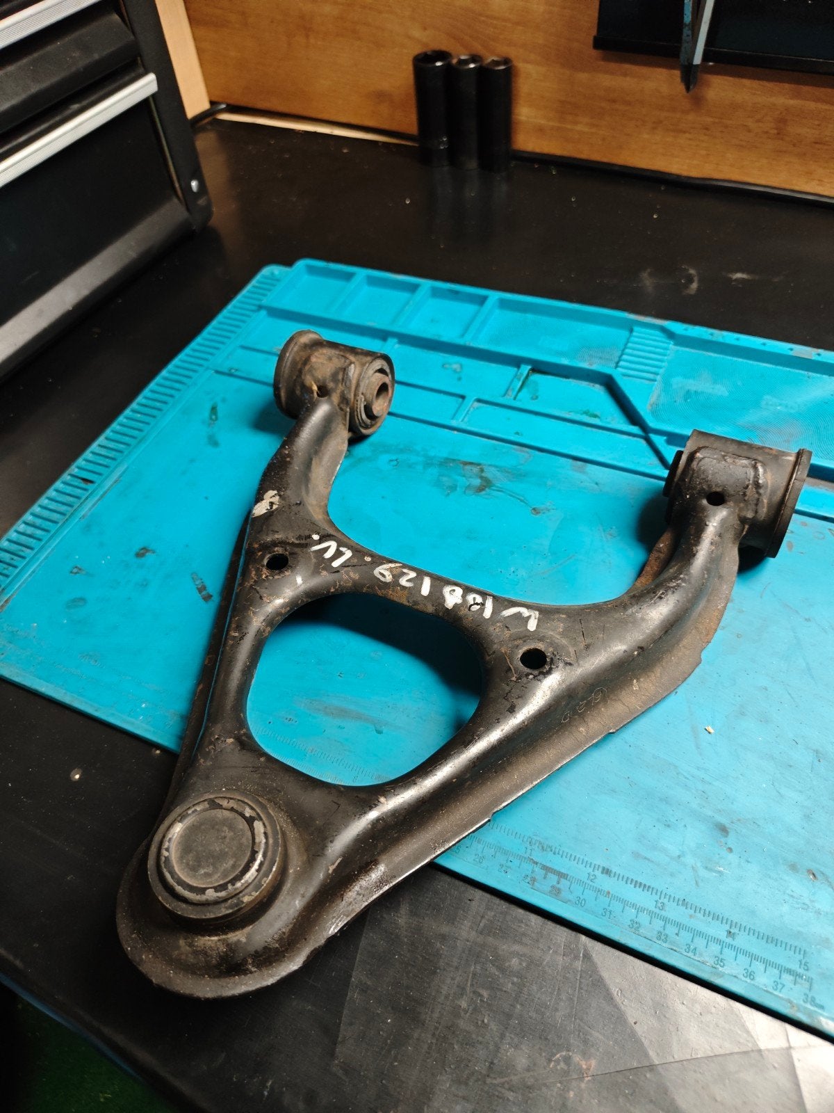 Mx5 NB draagarm linksvoor boven, Ophalen