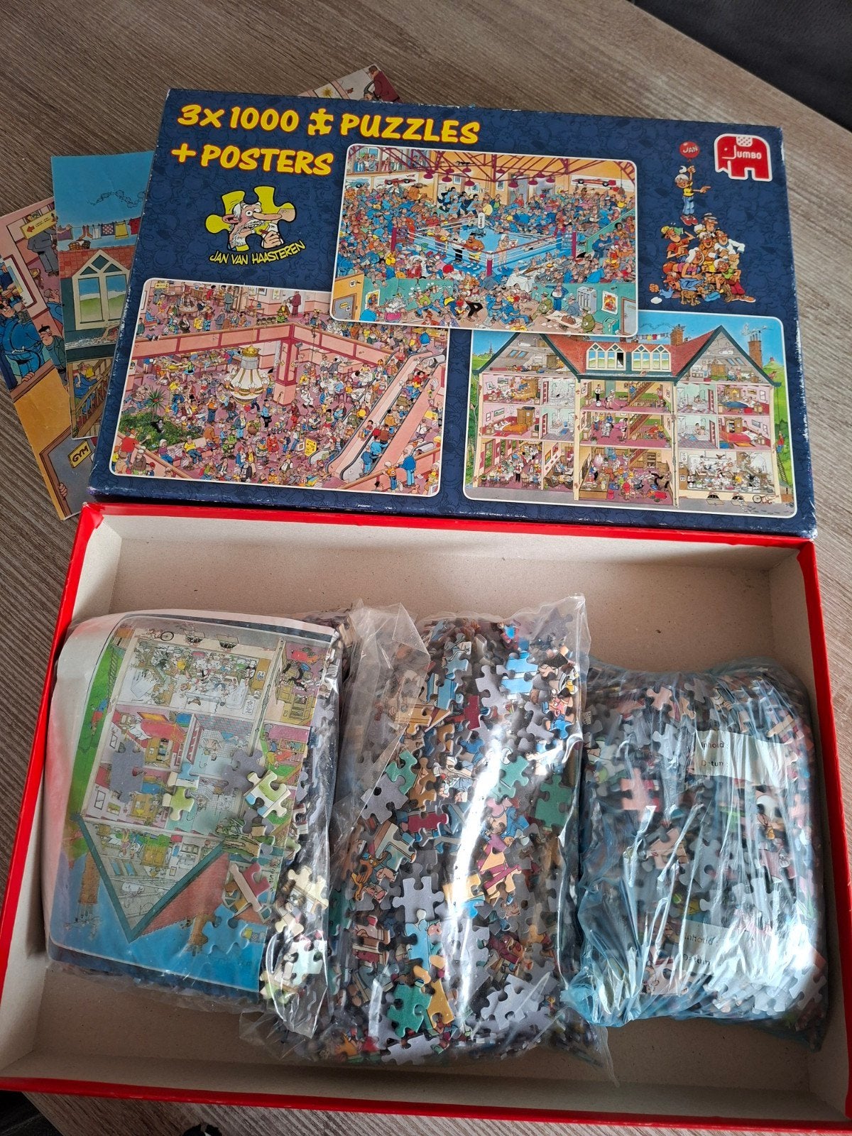 Jan van Haasteren 3x 1000 stukjes puzzels + posters, Ophalen of Verzenden, Meer dan 50 stukjes, Gebruikt, 6 jaar of ouder