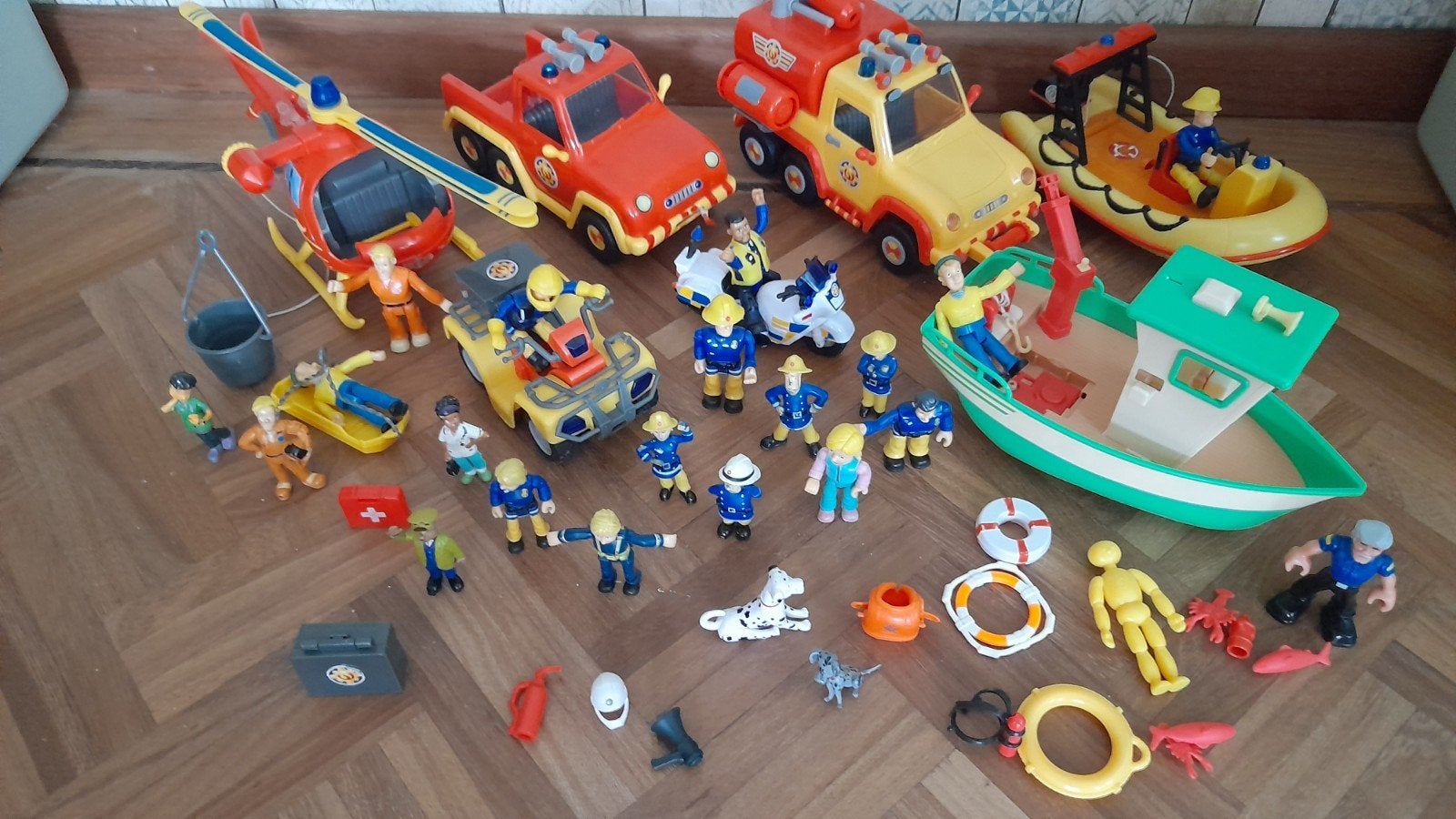 Zeven Brandweerman Sam voertuigen en diverse poppetjes, Ophalen of Verzenden, Gebruikt