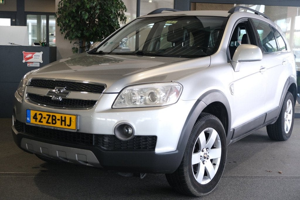 Chevrolet Captiva 2.4i Style 2WD Leder Trekhaak Pdc Airco CV, Auto's, Chevrolet, Voorwielaandrijving, 136 pk, Gebruikt, Zwart