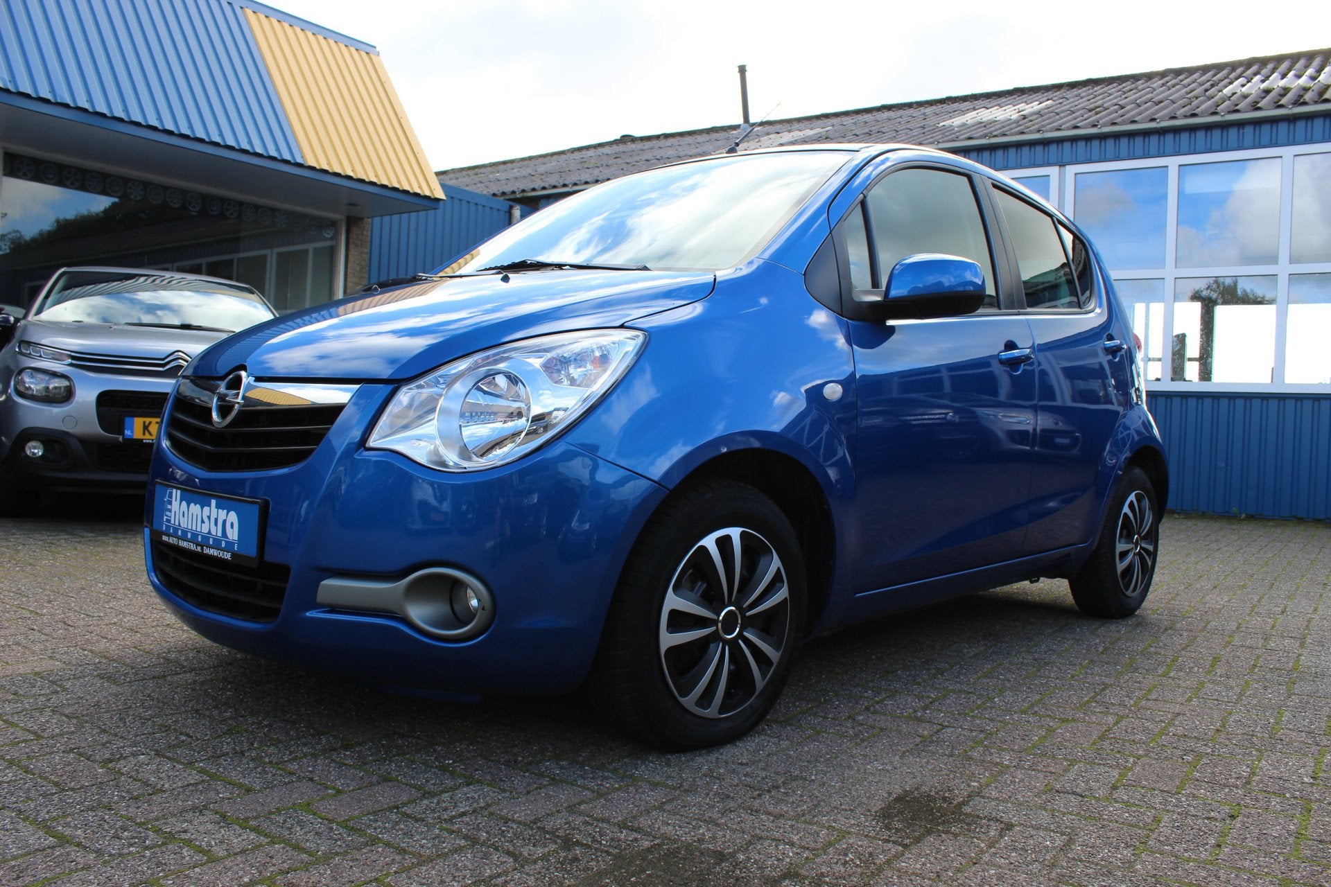 Opel Agila 1.0"Edition" Airco - Hoge instap (bj 2010), Auto's, Voorwielaandrijving, Elektrische ramen, Stof, Gebruikt