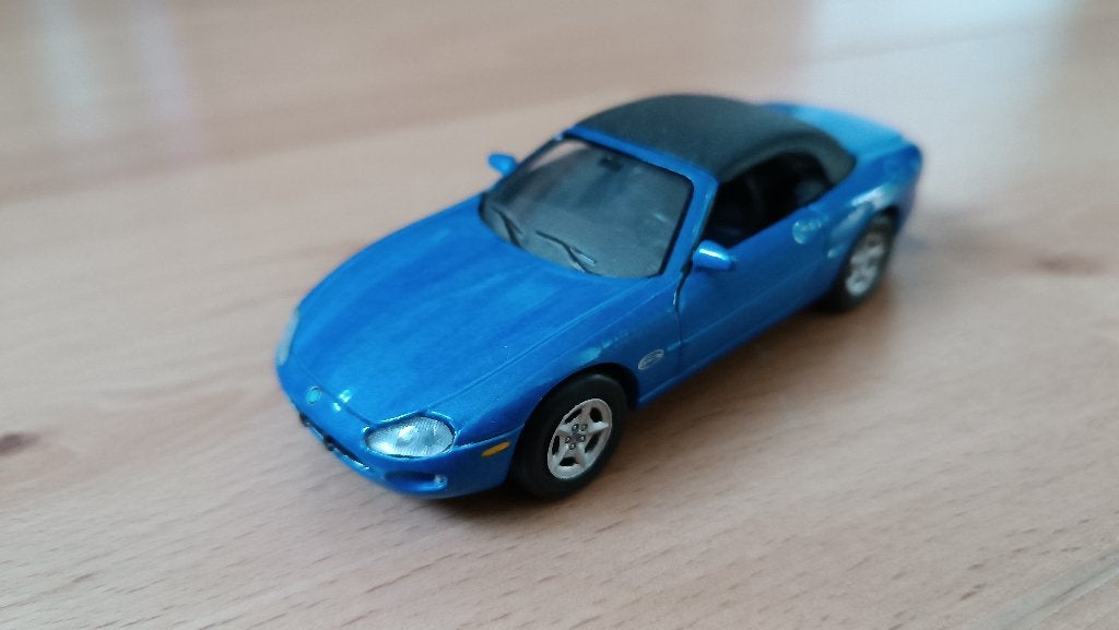 Jaguar XK 8 convertible 1:36 Welly, Hobby en Vrije tijd, Modelauto's | 1:43, Ophalen of Verzenden, Zo goed als nieuw, Auto, Overige merken