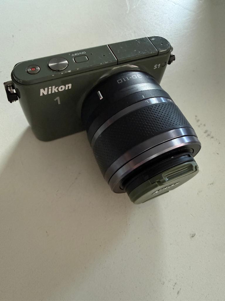 Nikon 1 S1 met 30-110mm lens met twee accu's en oplader, Gebruikt, Compact, 10 Megapixel, Ophalen of Verzenden
