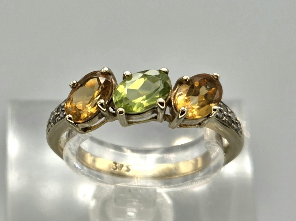 Gouden Vintage ring citrien en peridot en diamant. 2026/650