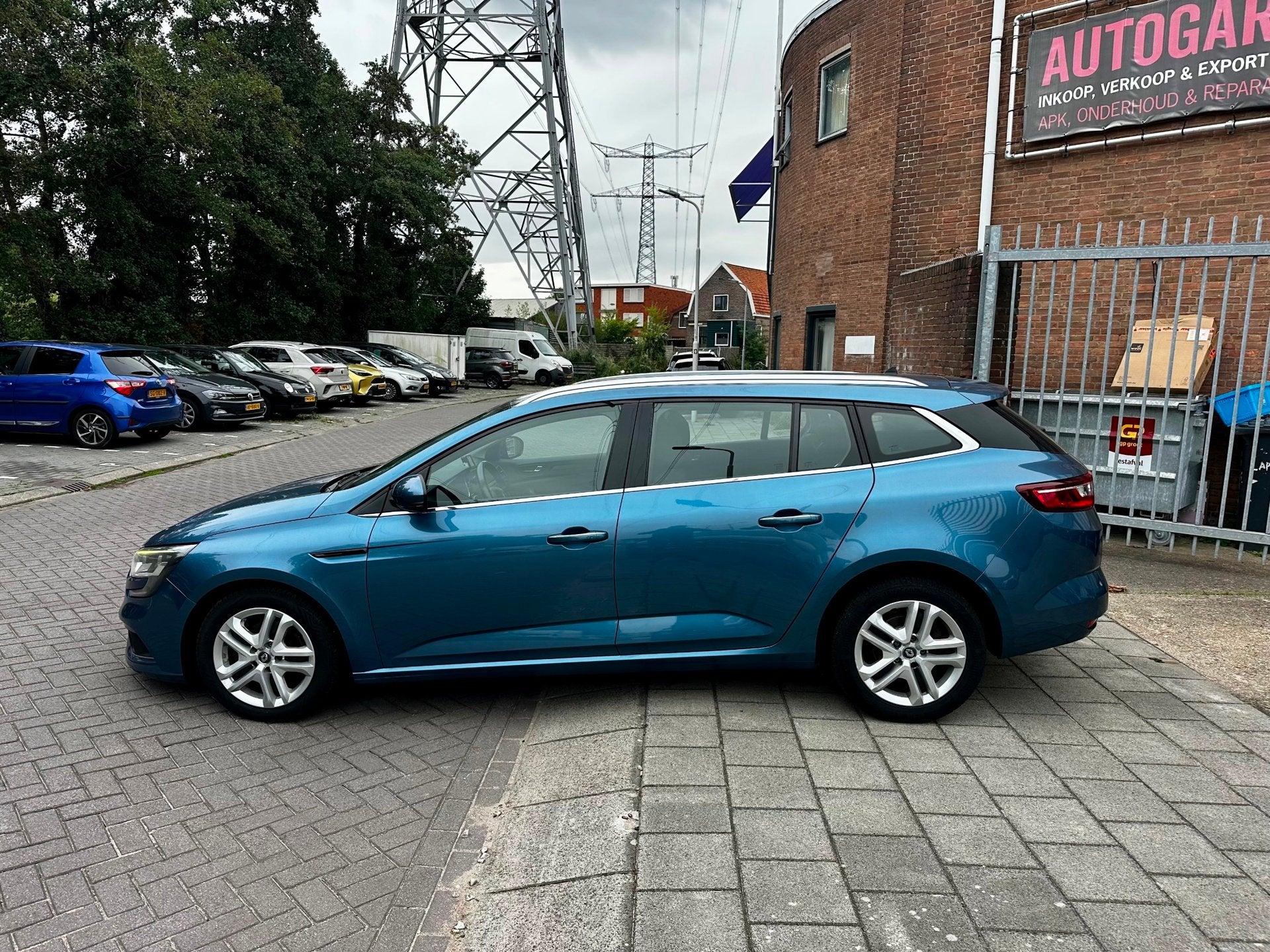 Renault Mégane Estate 1.5 dCi Zen Automaat, Auto's, Gebruikt, 4 cilinders, Blauw, Origineel Nederlands