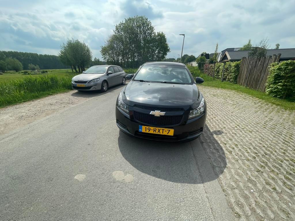 Chevrolet Cruze 1.6 83KW 2011 Zwart, Auto's, Chevrolet, Voorwielaandrijving, 15 km/l, 1280 kg, 4 cilinders