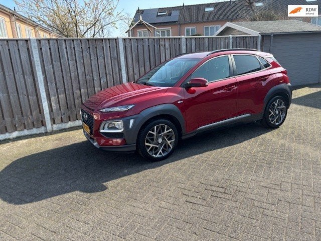 Hyundai Kona 1.6 GDI HEV premium Design Sky leder stoelverw., Auto's, Hyundai, Gebruikt, Zwart, Leder, Bedrijf