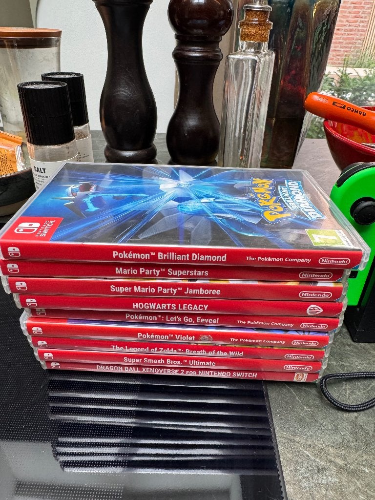 Nintendo switch + 9 games, Gebruikt, Overige genres, Ophalen of Verzenden, 3 spelers of meer