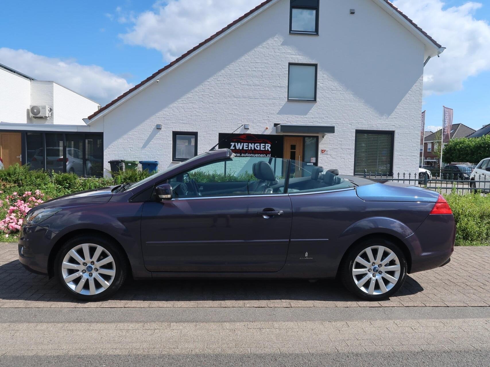 Ford Focus Cabriolet 1.6 NAVIGATIE|CARPLAY|LEDER|CRUISECONTR, Auto's, Gebruikt, Zwart, 4 cilinders, Cabriolet