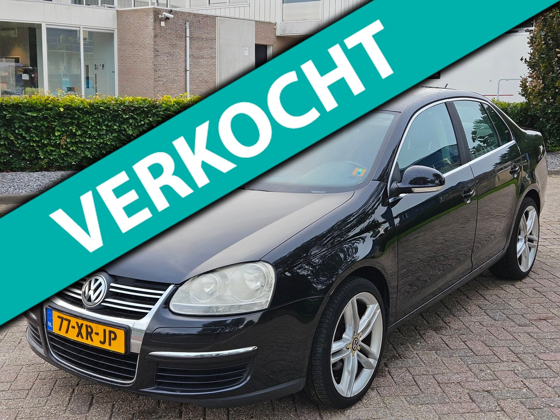 Volkswagen Jetta 2.0 FSI Comfortline, Auto's, Gebruikt, 4 cilinders, Zwart, Origineel Nederlands