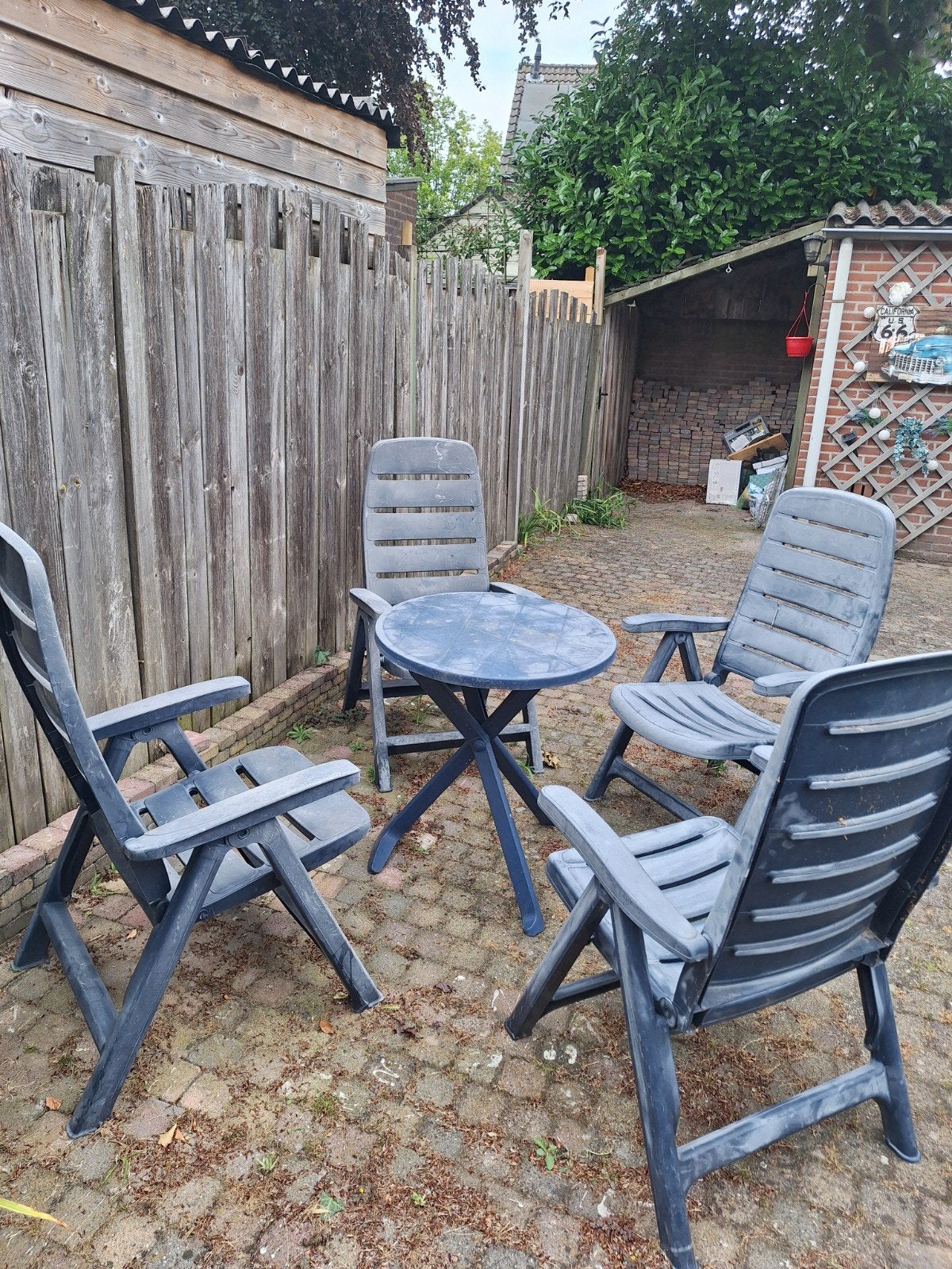 Kunststof tuinset met 4 stoelen en ronde tafel, Ophalen