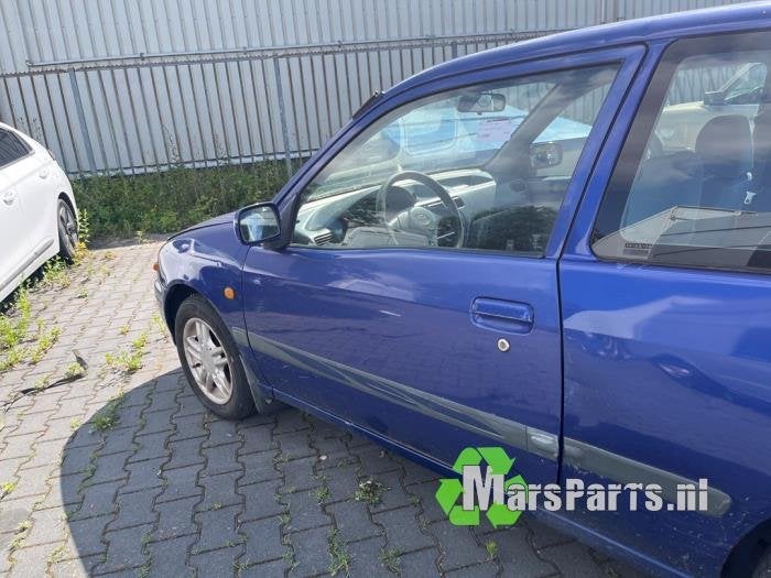 Portier 2Deurs links van een Toyota Starlet (8L5), Gebruikt, -, Deur, -