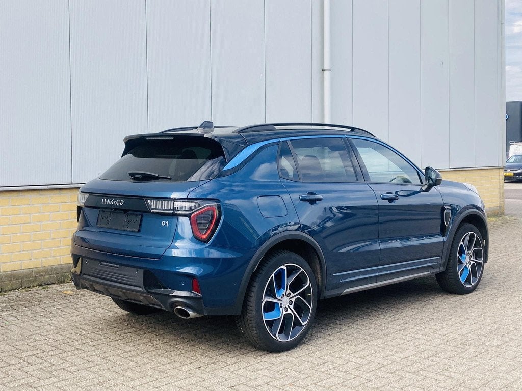 Lynk & Co 01 1.5 PHEV 261PK 1800KG Trekgewicht- Panorama Dak, Auto's, Lynk & Co, Stof, Euro 6, Blauw, Plug-in hybride