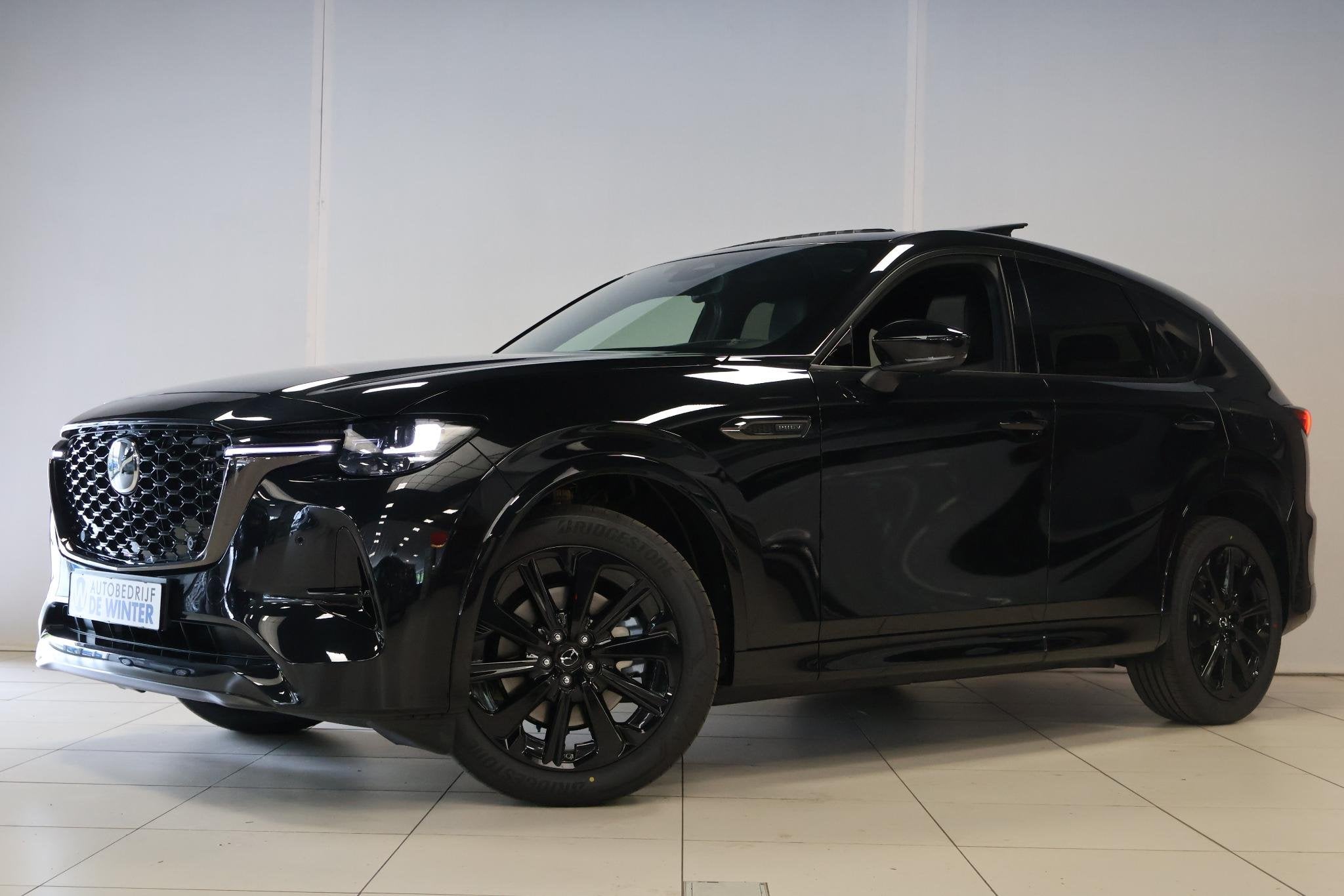 Mazda CX-60 2.5 e-SkyActiv PHEV Homura Plus, Auto's, Automaat, Gebruikt, Met garantie (alle), Zwart