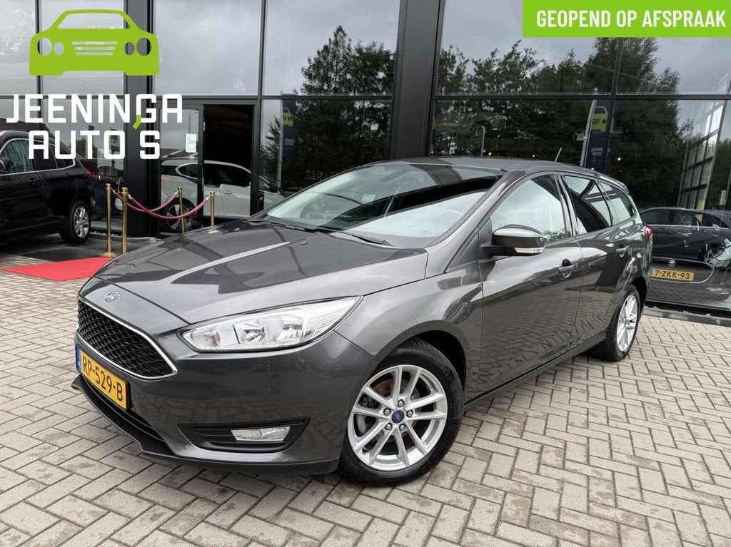 Ford Focus Wagon 1.0 Titanium|Clima|Navi|Trekhaak, Gebruikt, Origineel Nederlands, Handgeschakeld, 1216 kg