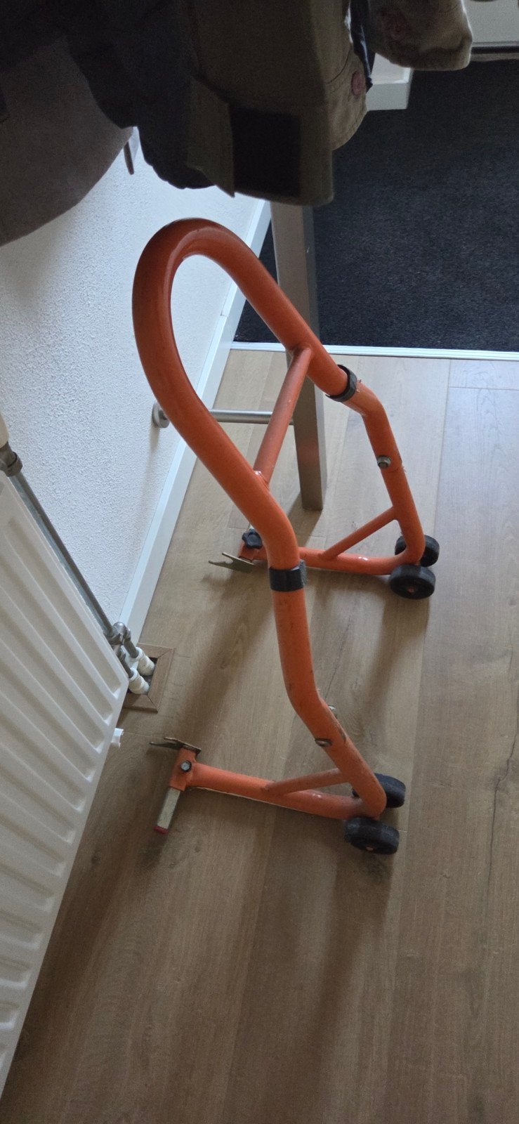 paddock voor motorfiets, Ophalen
