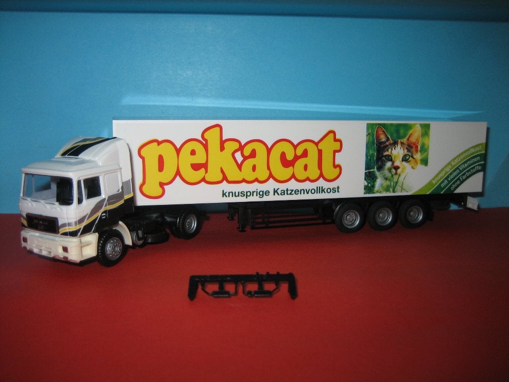 Pekacat  MAN met oplegger  AWM, Hobby en Vrije tijd, Modelauto's | 1:87, Ophalen of Verzenden, Zo goed als nieuw, Bus of Vrachtwagen