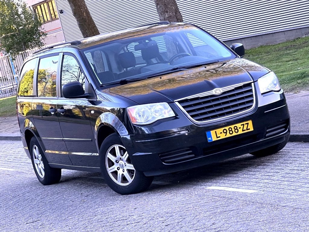 Grand Town & Country 3.8i Stow&Go M2009 7pers Dvd Tv Inr Mog, Traction-control, Grand Voyager, Zwart, Bedrijf
