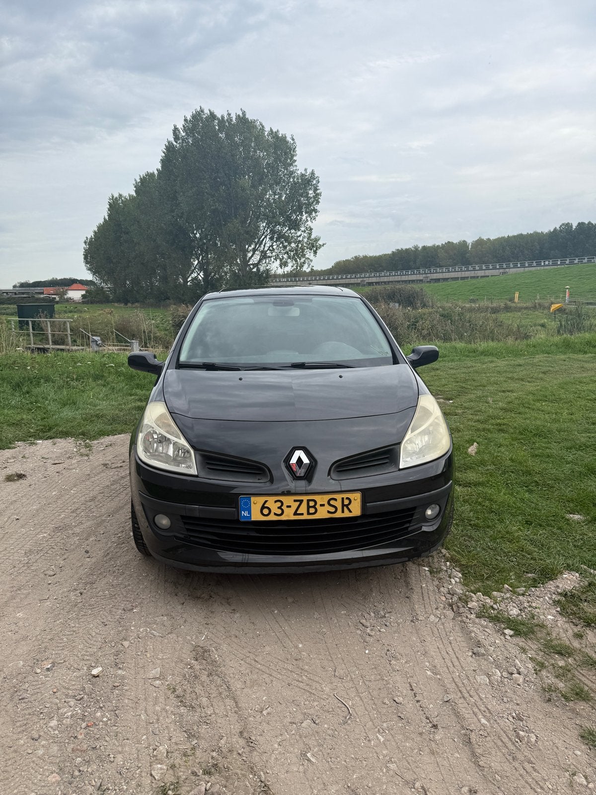 Renault Clio 1.6 16V PANO 3-DRS AUT 2008 Zwart, 535 kg, 4 cilinders, Verwarmde buitenspiegels, Zwart