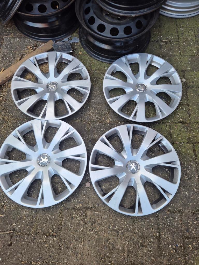 Set van 4 Peugeot wieldoppen 15 inch, Ophalen of Verzenden, Gebruikt