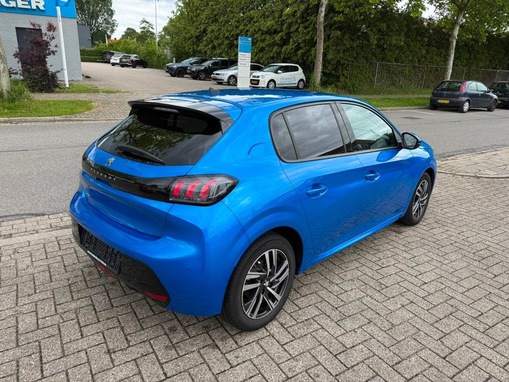 Peugeot 208 1.2 PureTech Allure 100PK, Navi Dealer auto, Auto's, Voorwielaandrijving, 101 pk, Gebruikt, Blauw