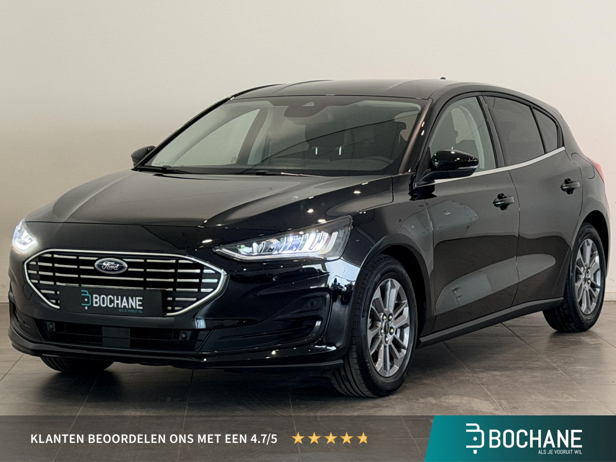Ford Focus 1.0 EcoBoost Hybrid Titanium | Navigatie | Climat, Gebruikt, Met garantie (alle), Zwart, Origineel Nederlands